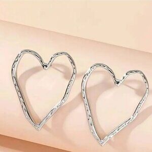 Heart silvertone stud earrings